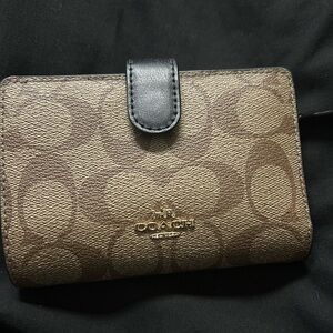 Small COACH wallet.